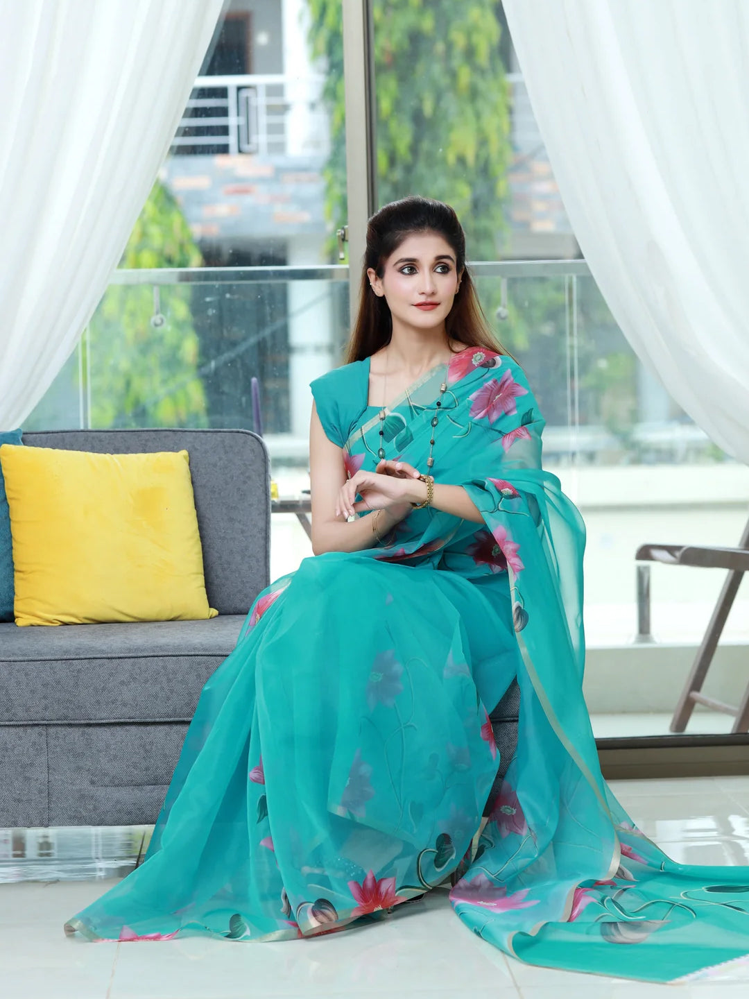 Stunning Peach Turquoise Organza Saree - Floral Print Design