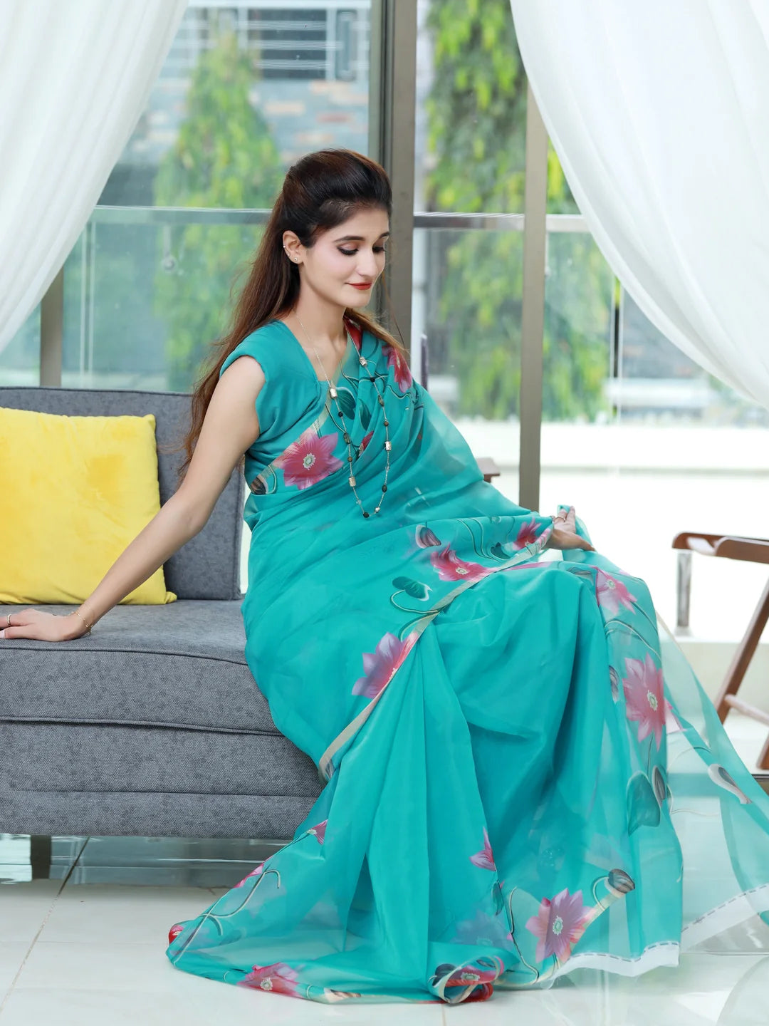 Stunning Peach Turquoise Organza Saree - Floral Print Design