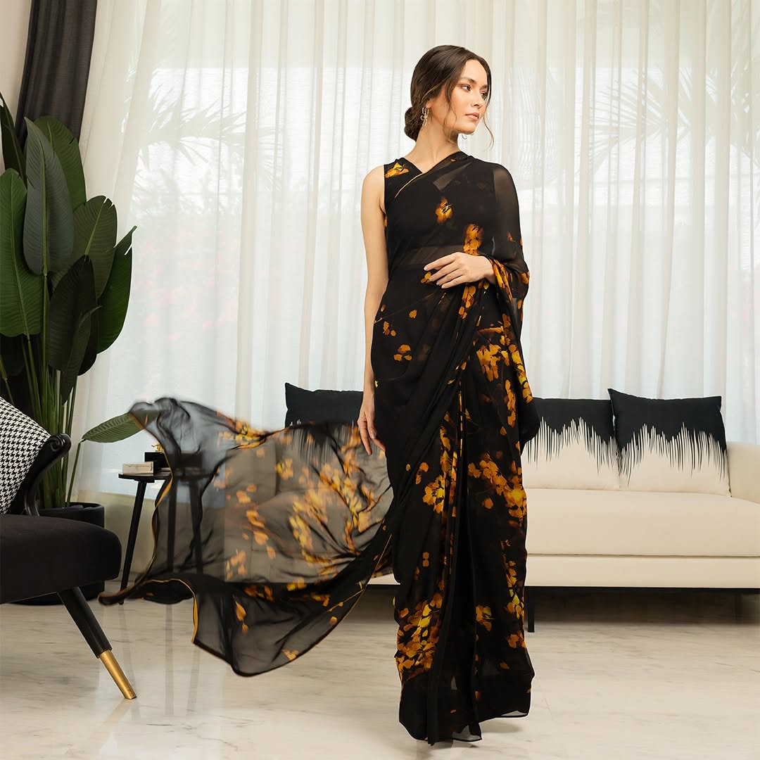 Elegant Black and Orange Floral Silk Blend Saree with Unstitched Blouse