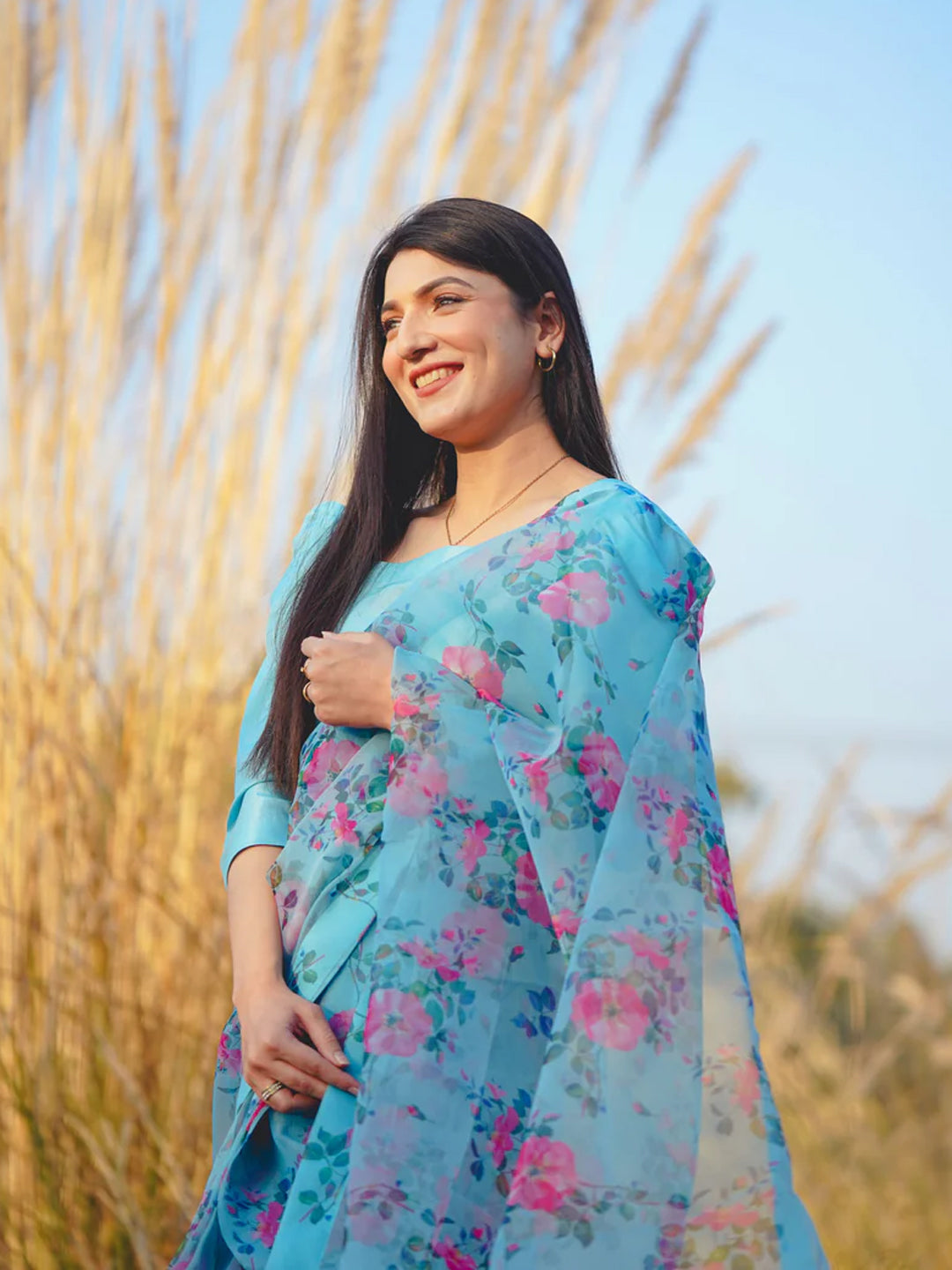 Stunning Sky Blue Organza Saree - Pink Floral Print