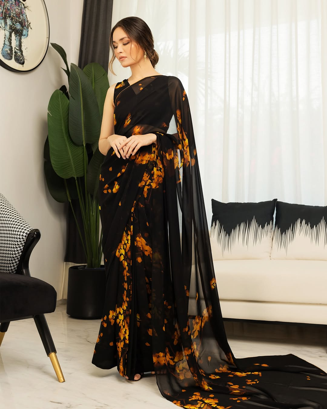 Elegant Black and Orange Floral Silk Blend Saree with Unstitched Blouse