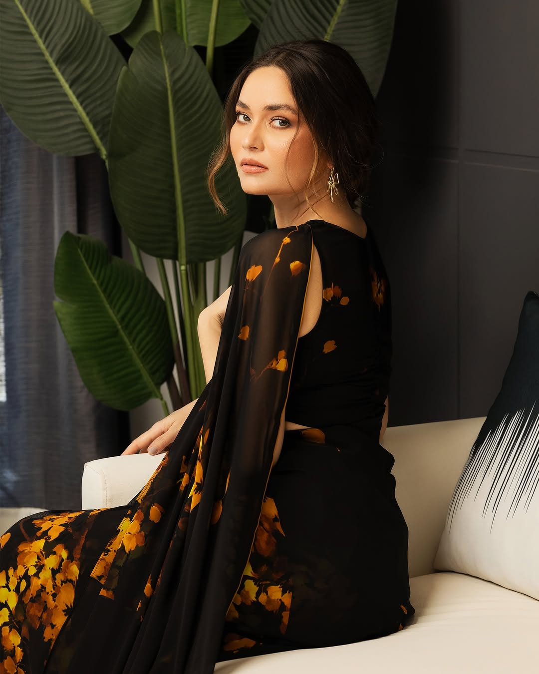 Elegant Black and Orange Floral Silk Blend Saree with Unstitched Blouse